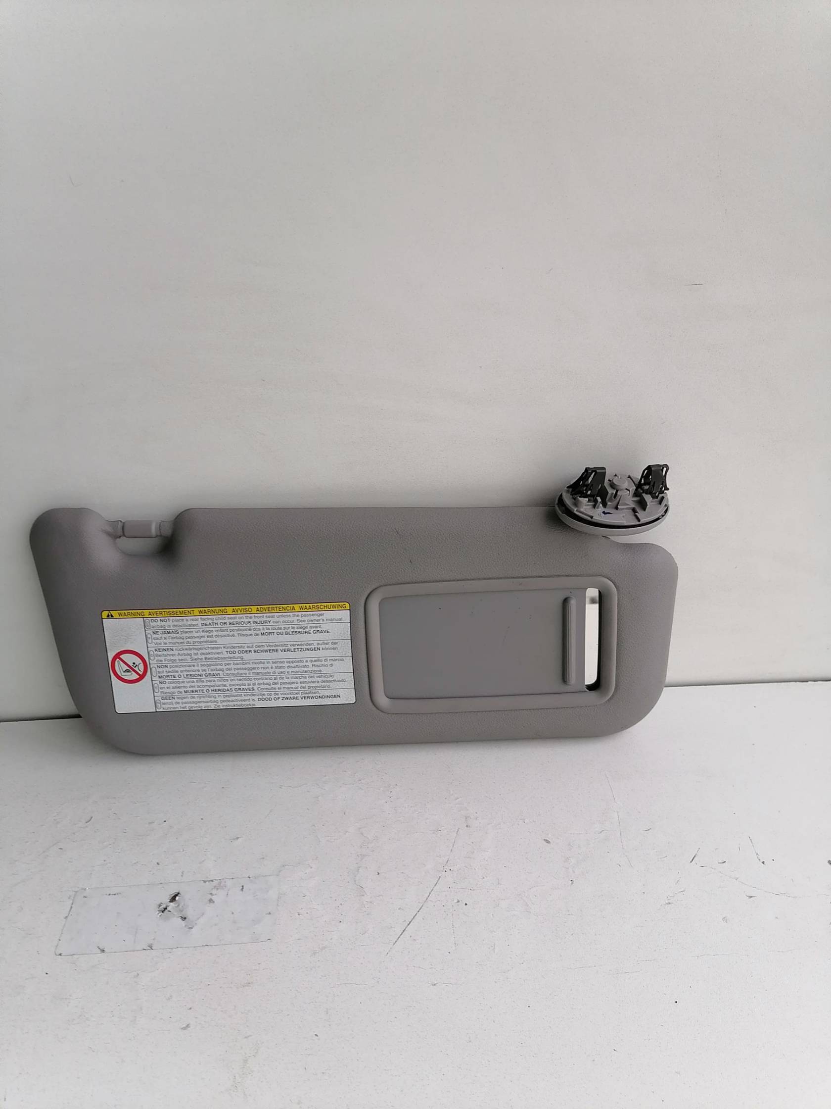 Aletta parasole parabrezza dx.